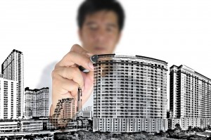 Business man or architect draw building and cityscape on white background